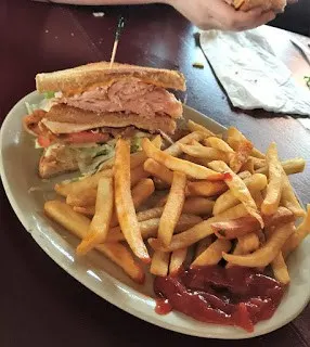 Triple-Decker Turkey Sandwich with Fries
