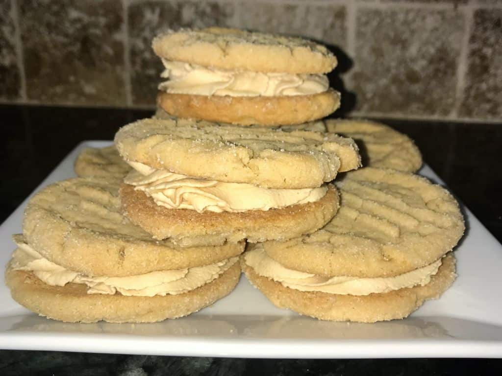 peanut butter cookie sandwiches on plate