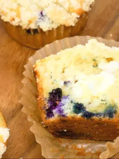 blueberry cream cheese muffins with streusel topping