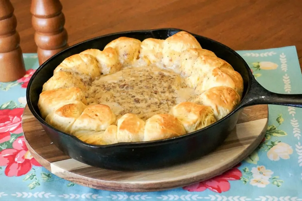 Biscuit and Gravy Ring served in a cast iron skillet