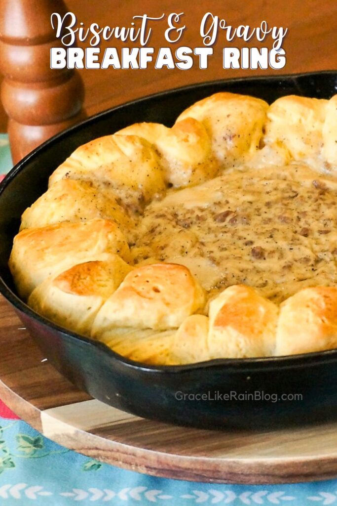 biscuit and gravy ring in a skillet sitting on the breakfast table