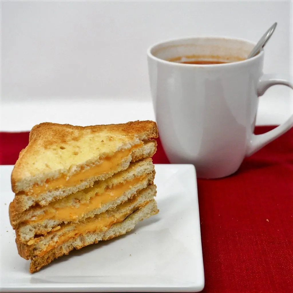 Grilled Cheese Sandwich and Cup of Tomato Soup