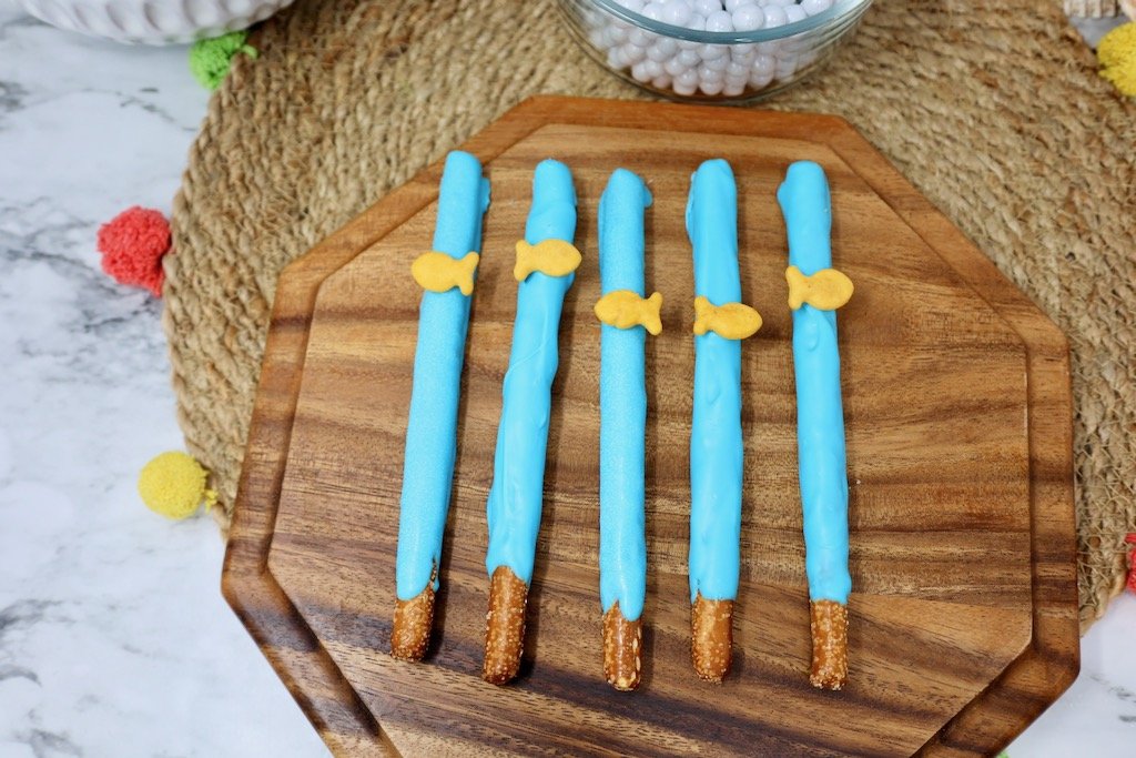 blue candy coated pretzels with goldfish