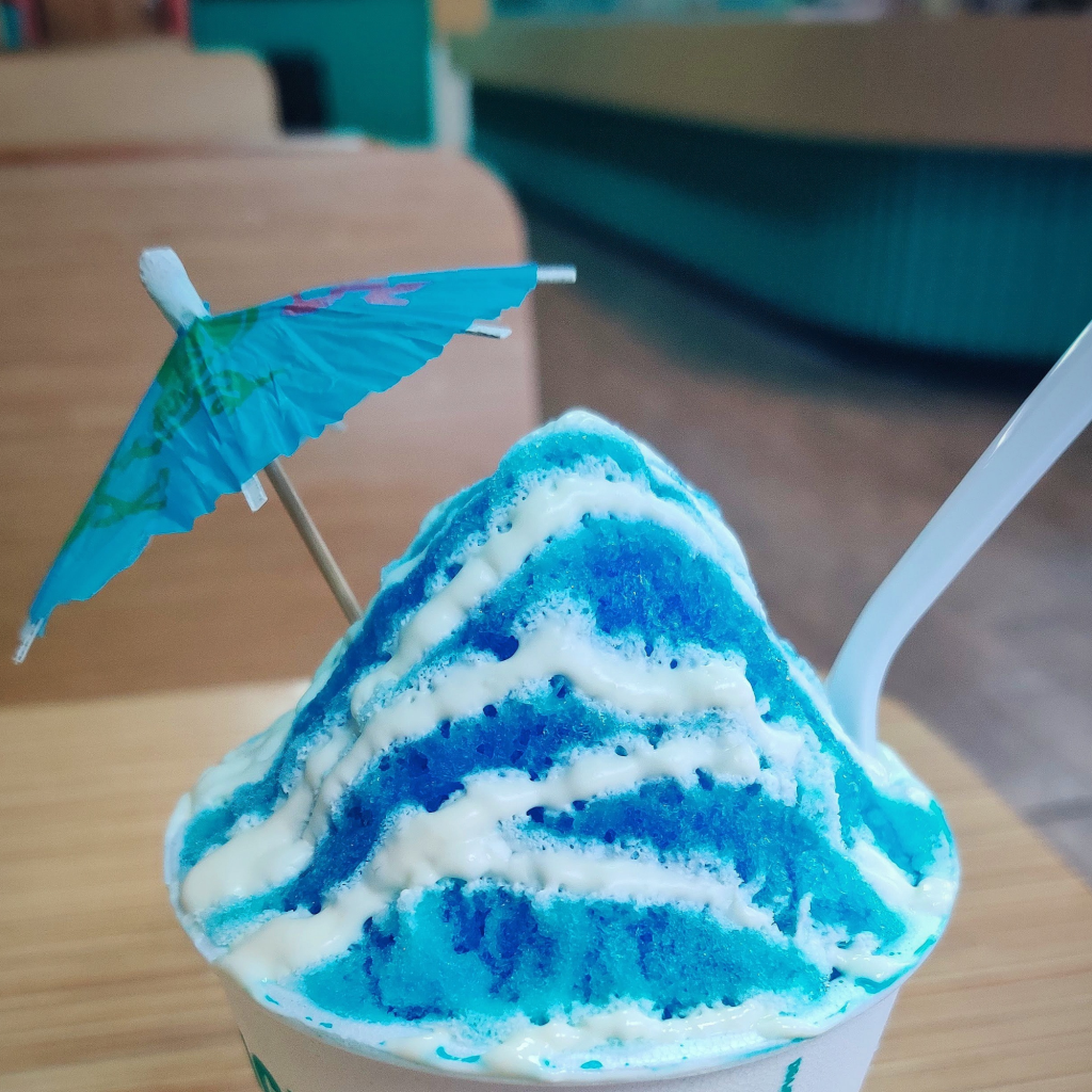 snow cone with blue umbrella