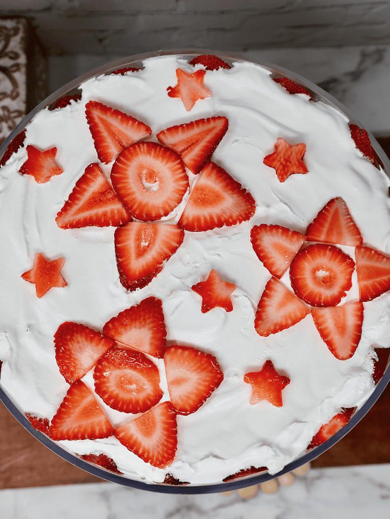 Strawberry pound cake trifle in a pretty trifle dish for serving Easter lunch