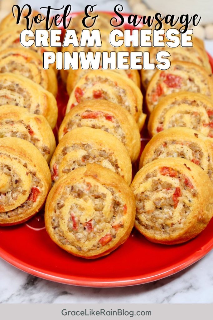 rotel sausage and cream cheese pinwheels on a red tray