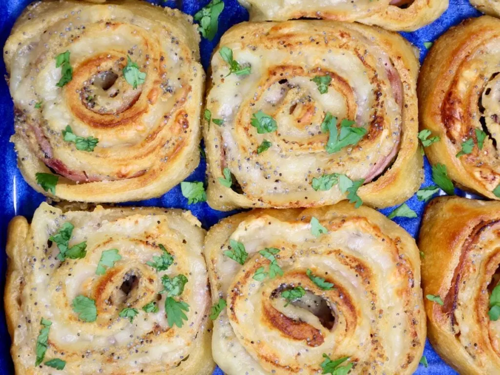 party appetizer pinwheels made with ham and swiss in crescent dough