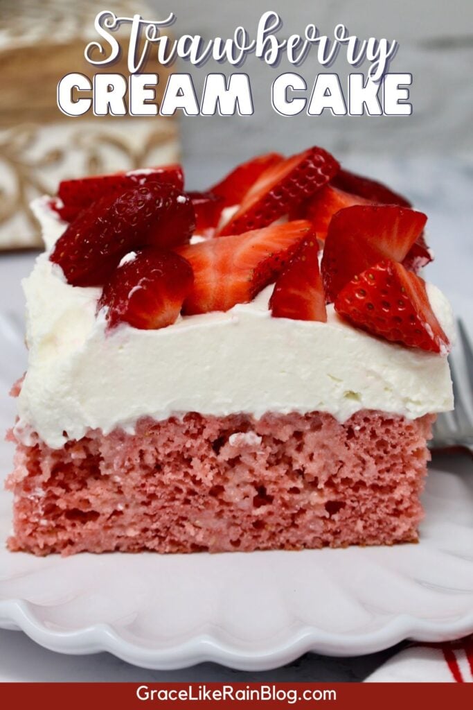 a slice of strawberry cream cake on a pretty plate ready to serve