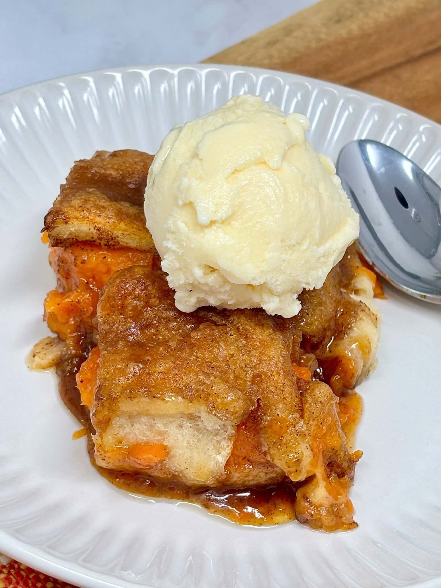 sweet potato crescent dumplings with ice cream on top