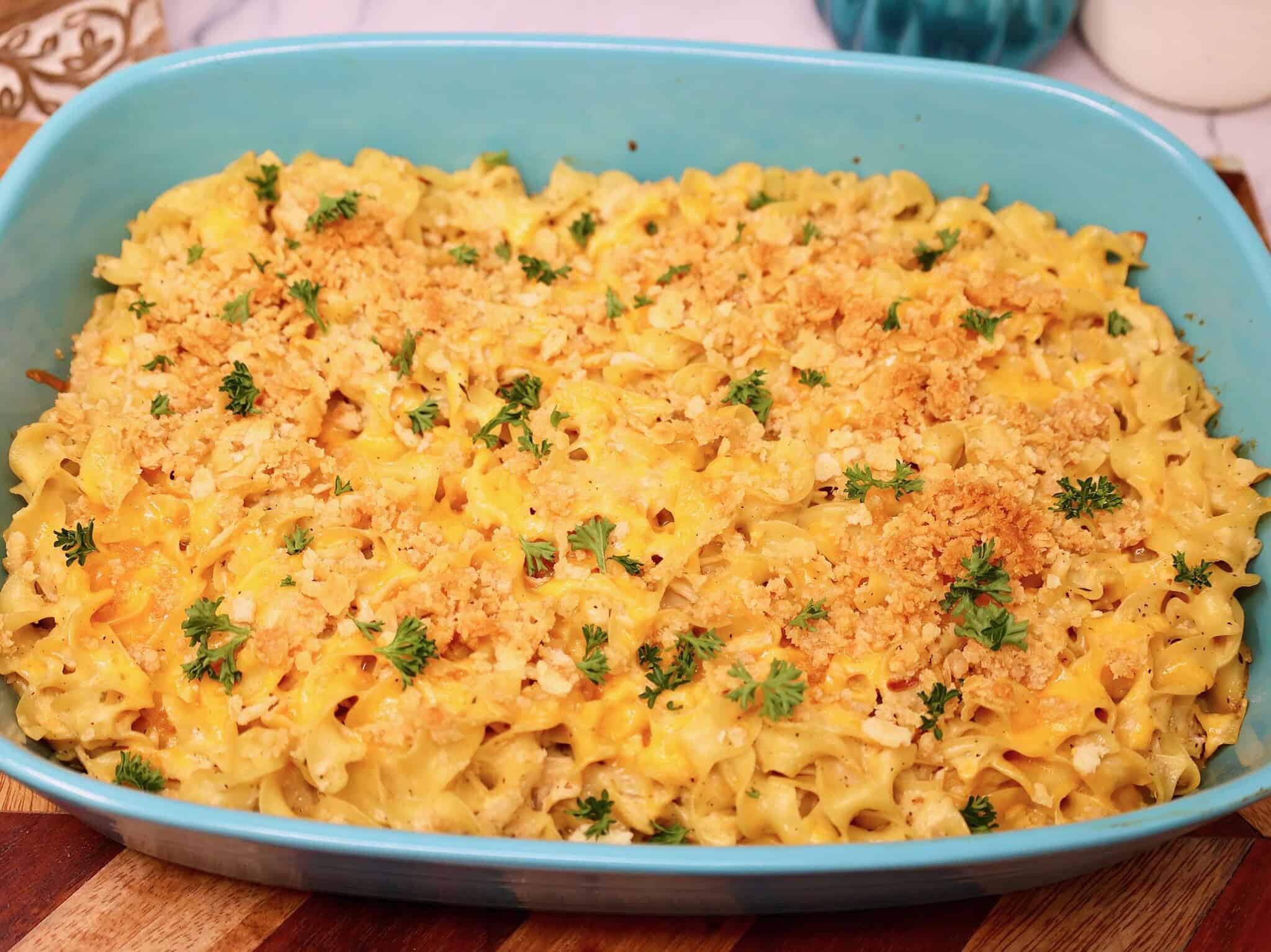 Creamy canned chicken noodle casserole baked in a 9x13 dish with golden topping
