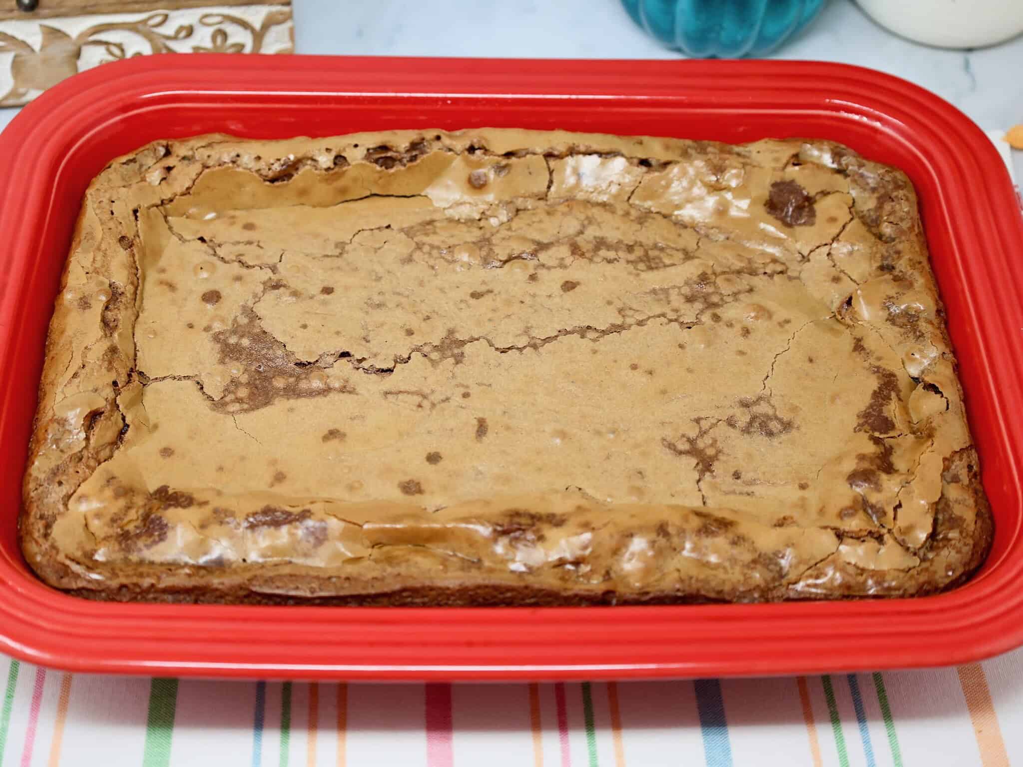 Chocolate Gooey Butter Cake bars in a 9x13 baking dish