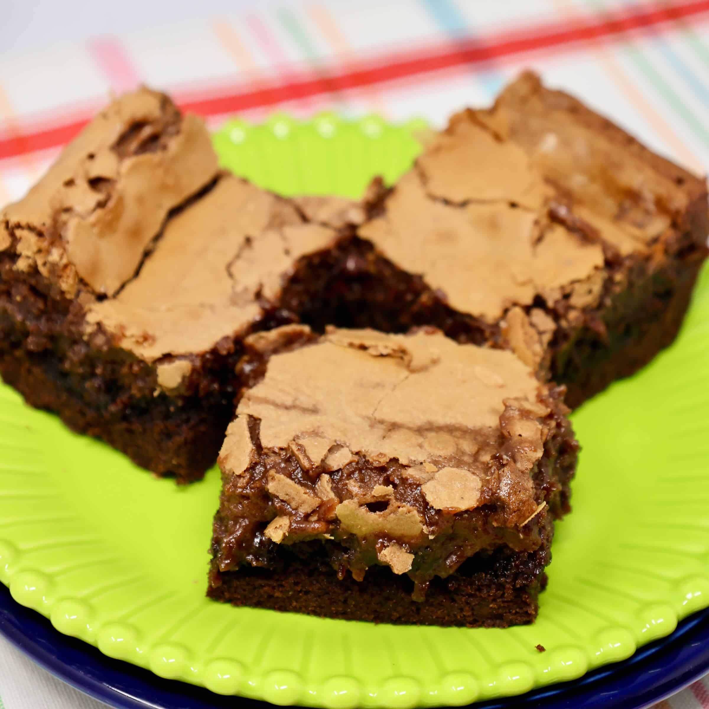 Easy chocolate gooey butter cake for a crowd served as delicious bars