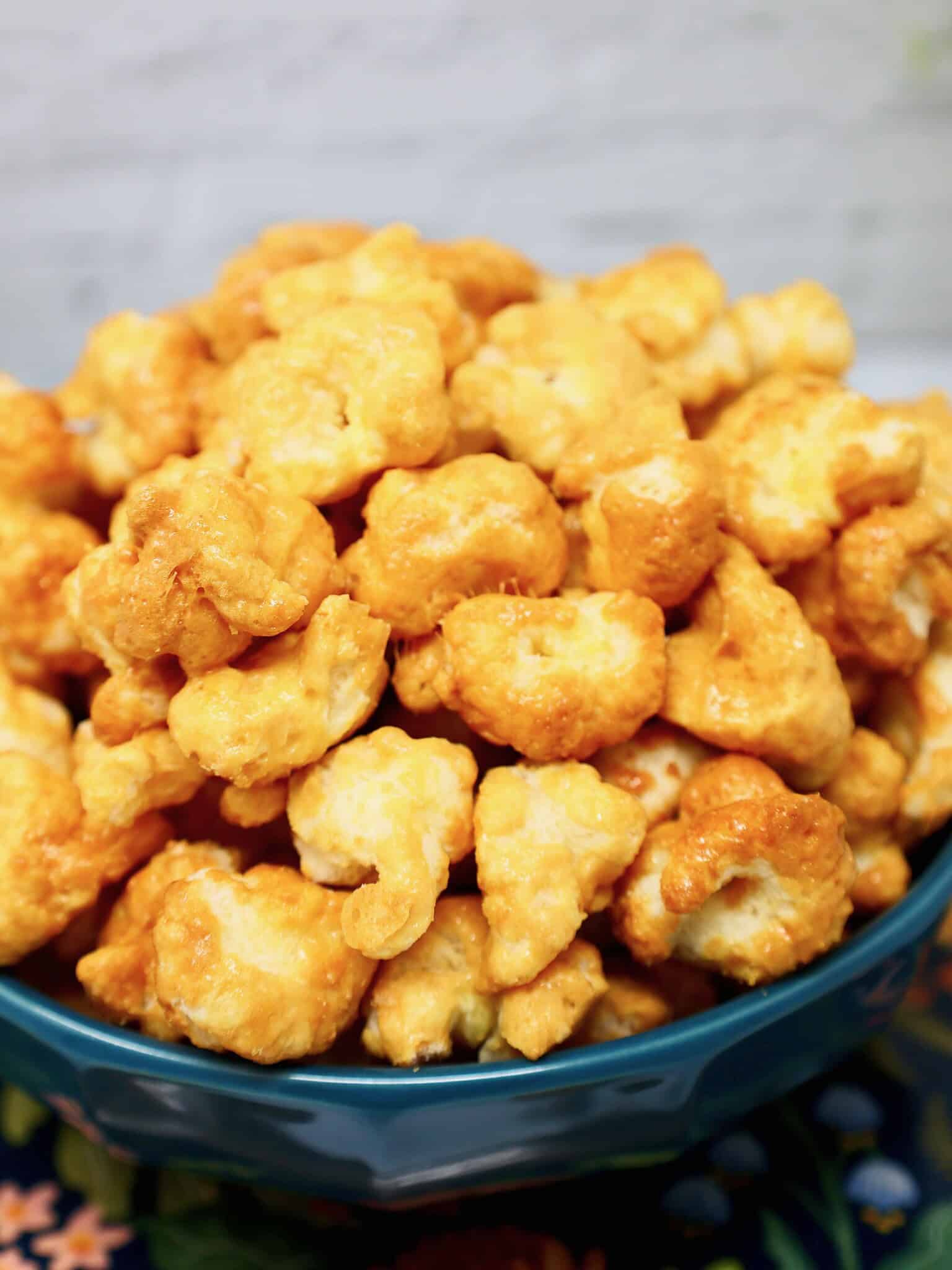 close up of crunchy caramel corn puffs for homemade Beaver Nuggets recipe