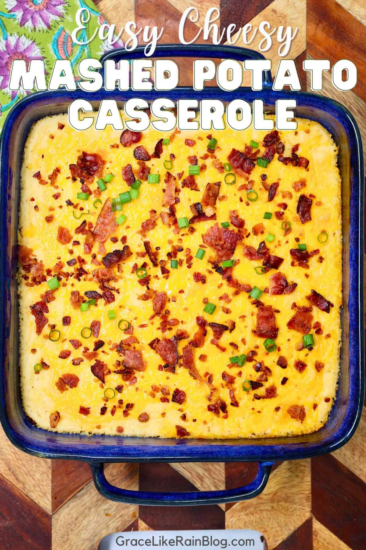 cheesy mashed potato casserole with melted cheddar cheese in baking dish