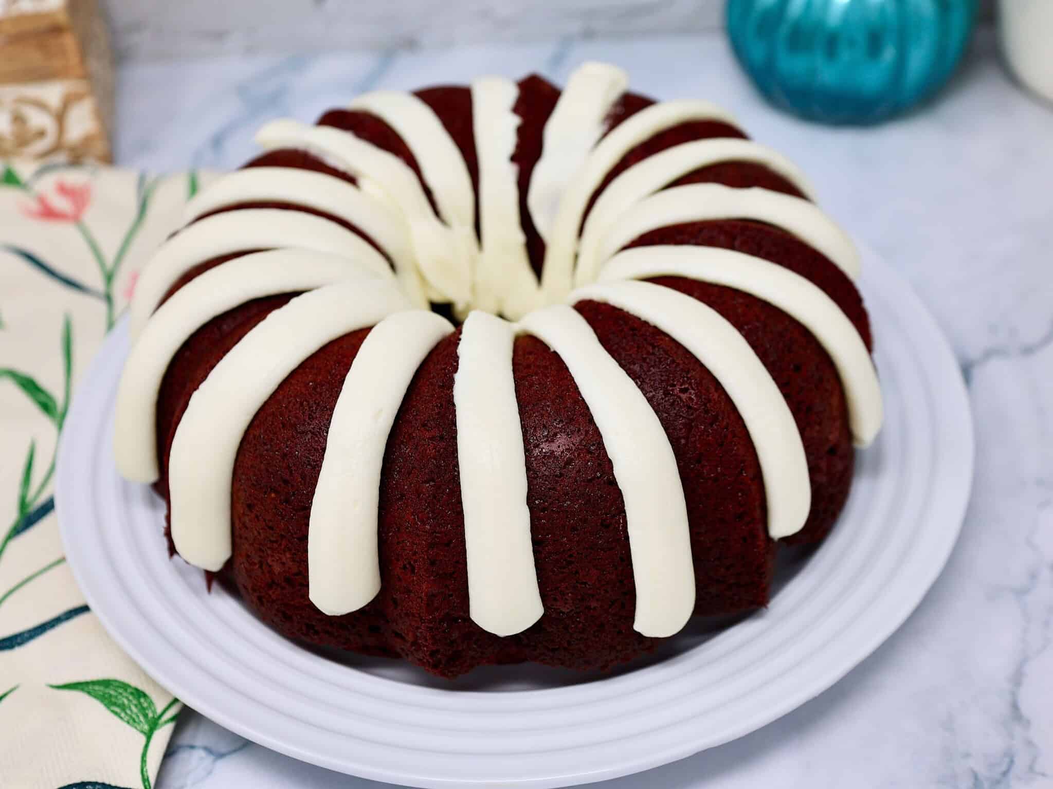 Homemade red velvet Bundt cake on serving plate