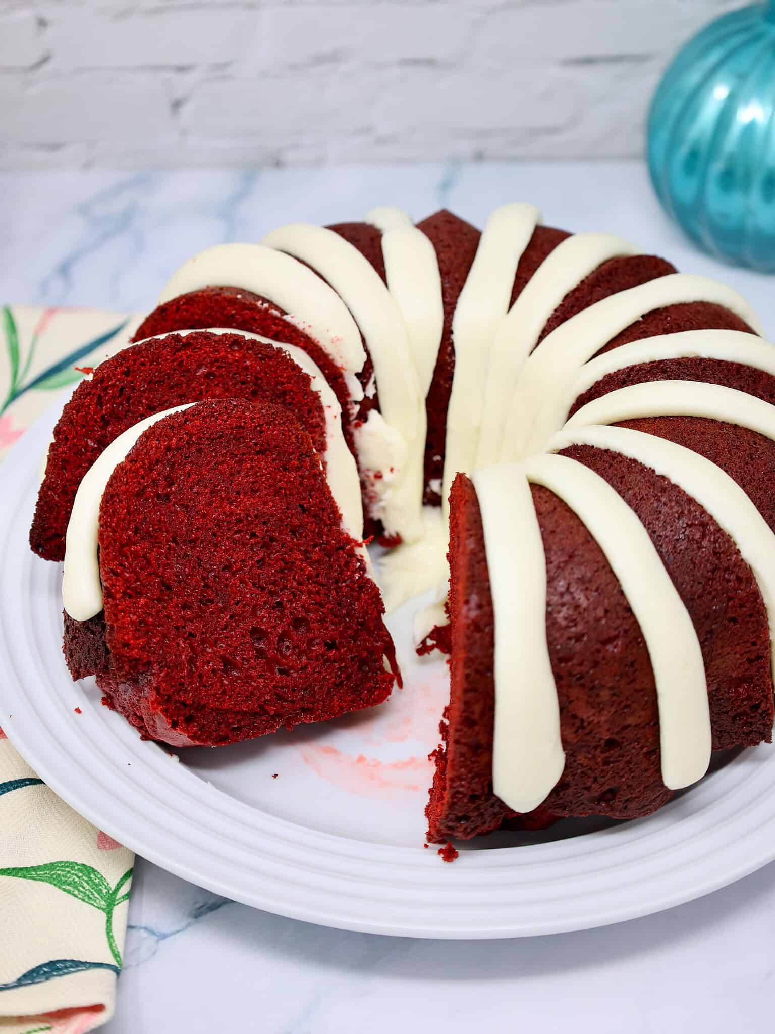 Red velvet Bundt cake with cream cheese glaze, bakery-style dessert