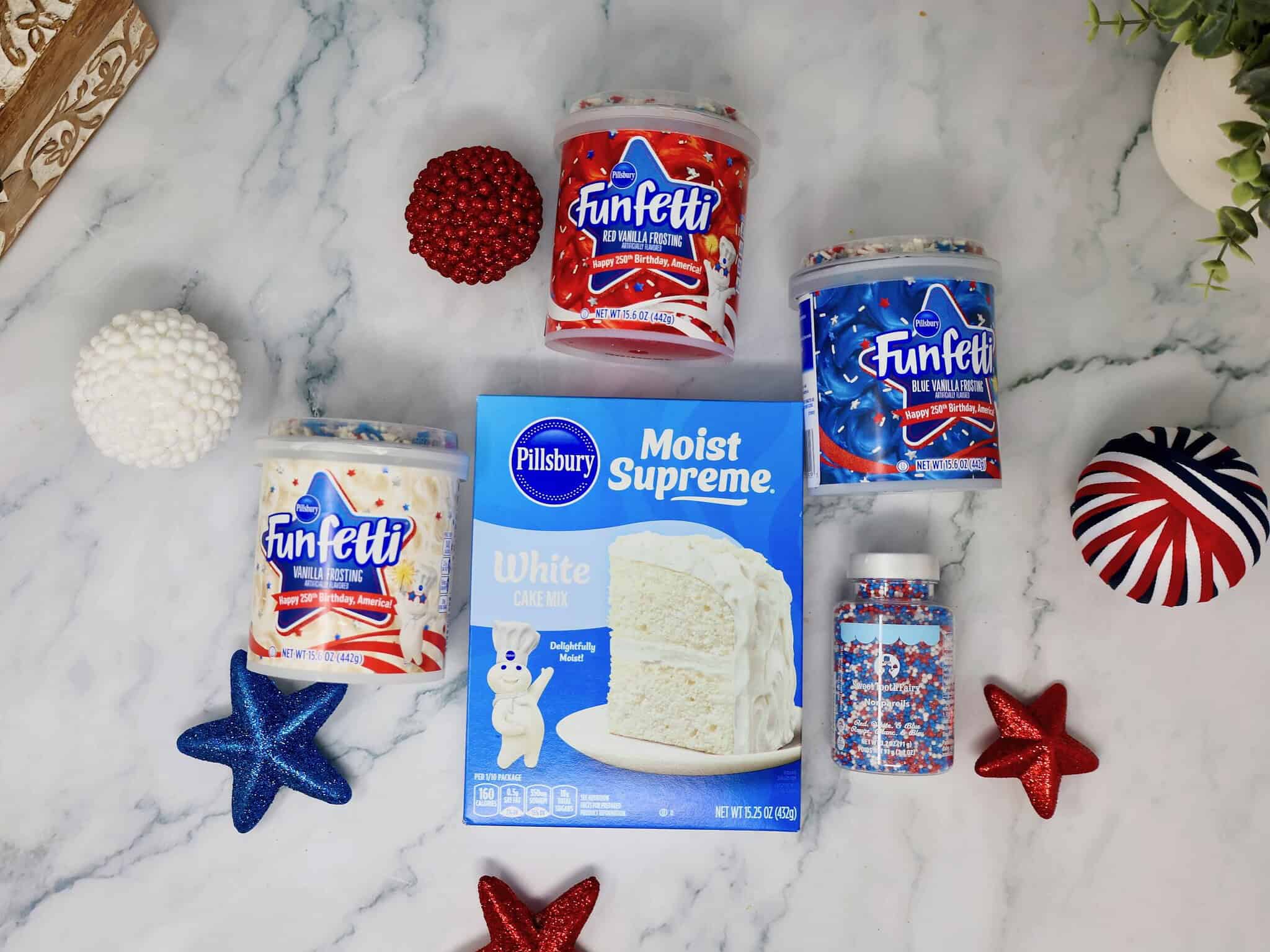 simple ingredients you'll need for dot cakes include white cake mix, funfetti frosting, and nonpareils dot sprinkles
