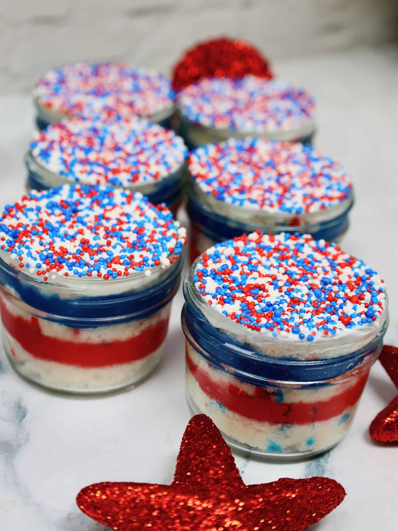 Viral Patriotic Dot Cakes arranged in glass jars with colorful dot toppings