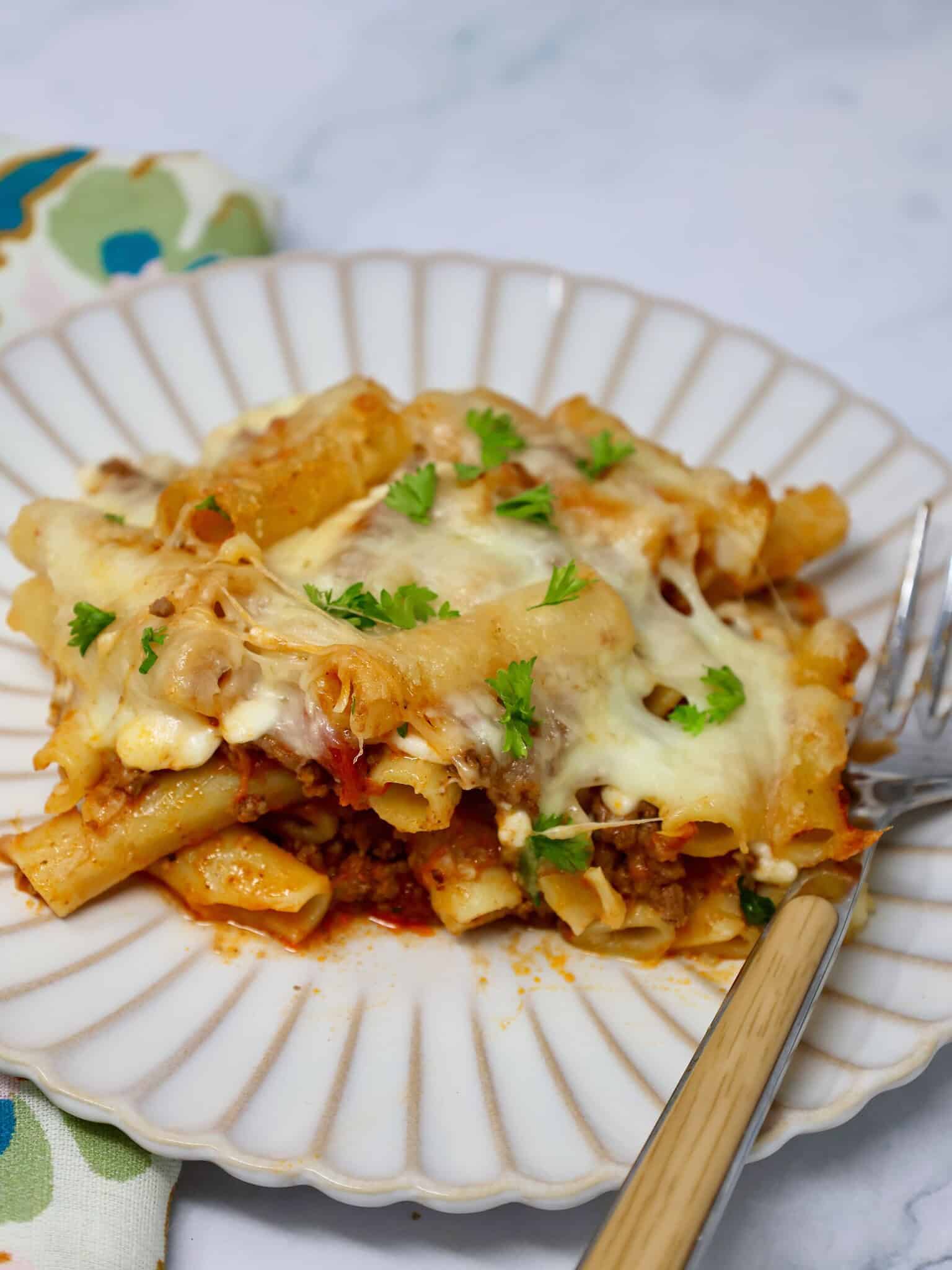 Close up of easy baked ziti with cottage cheese and melted cheese topping