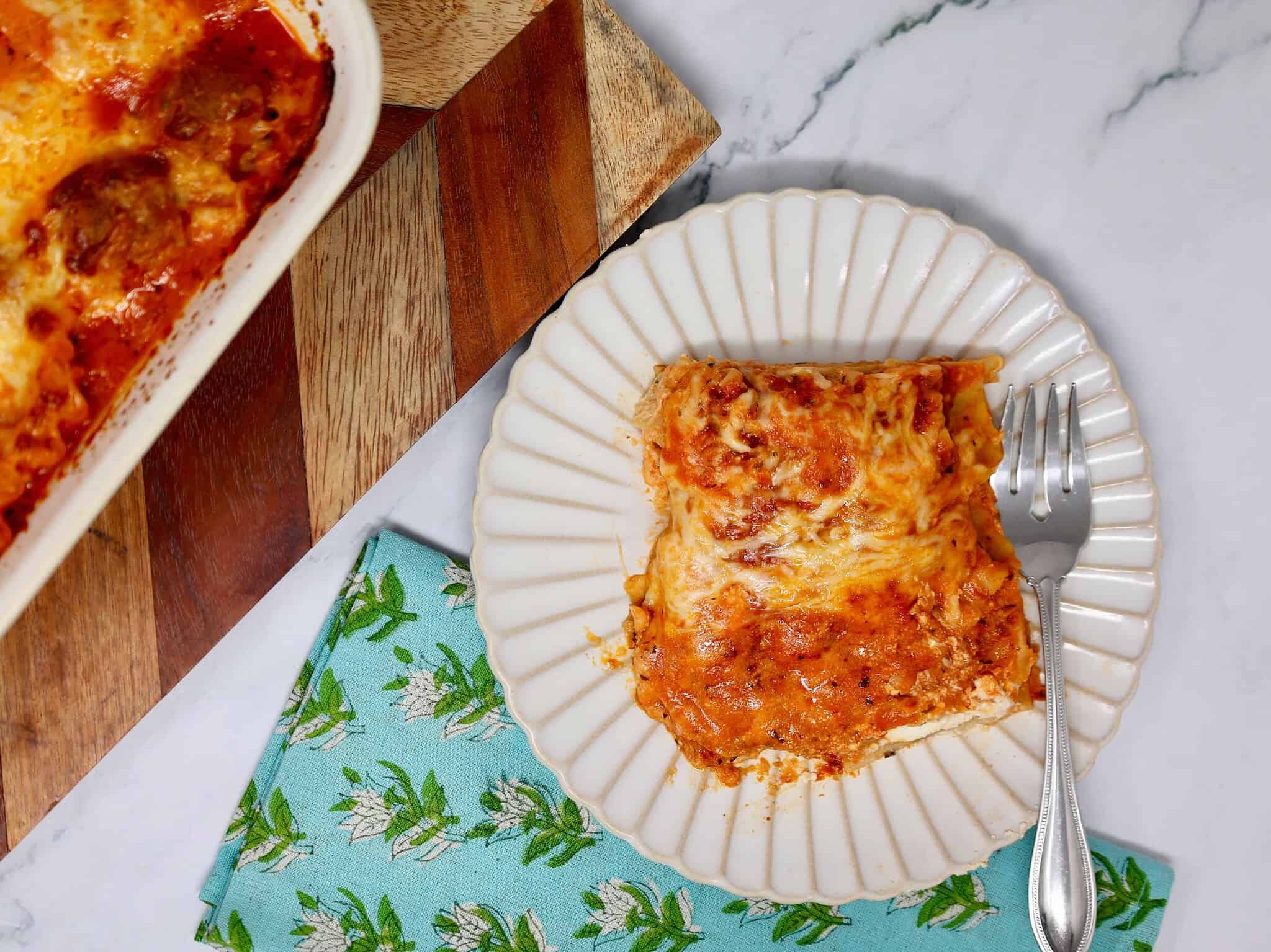 Close-up of a serving of lazy lasagna with marinara sauce and mozzarella cheese