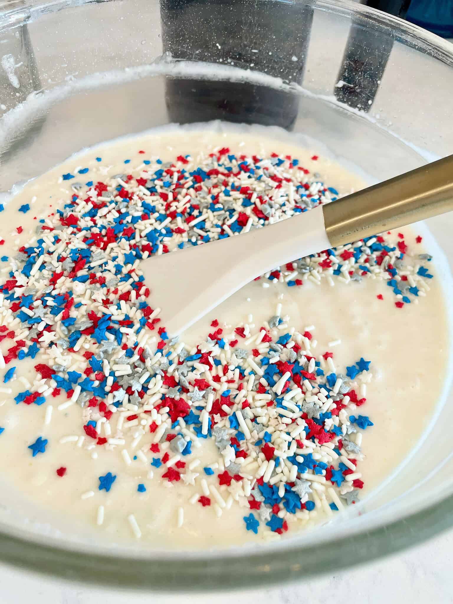 add the sprinkles from the Funfetti frosting containers into the cake for a Funfetti cake upgrade