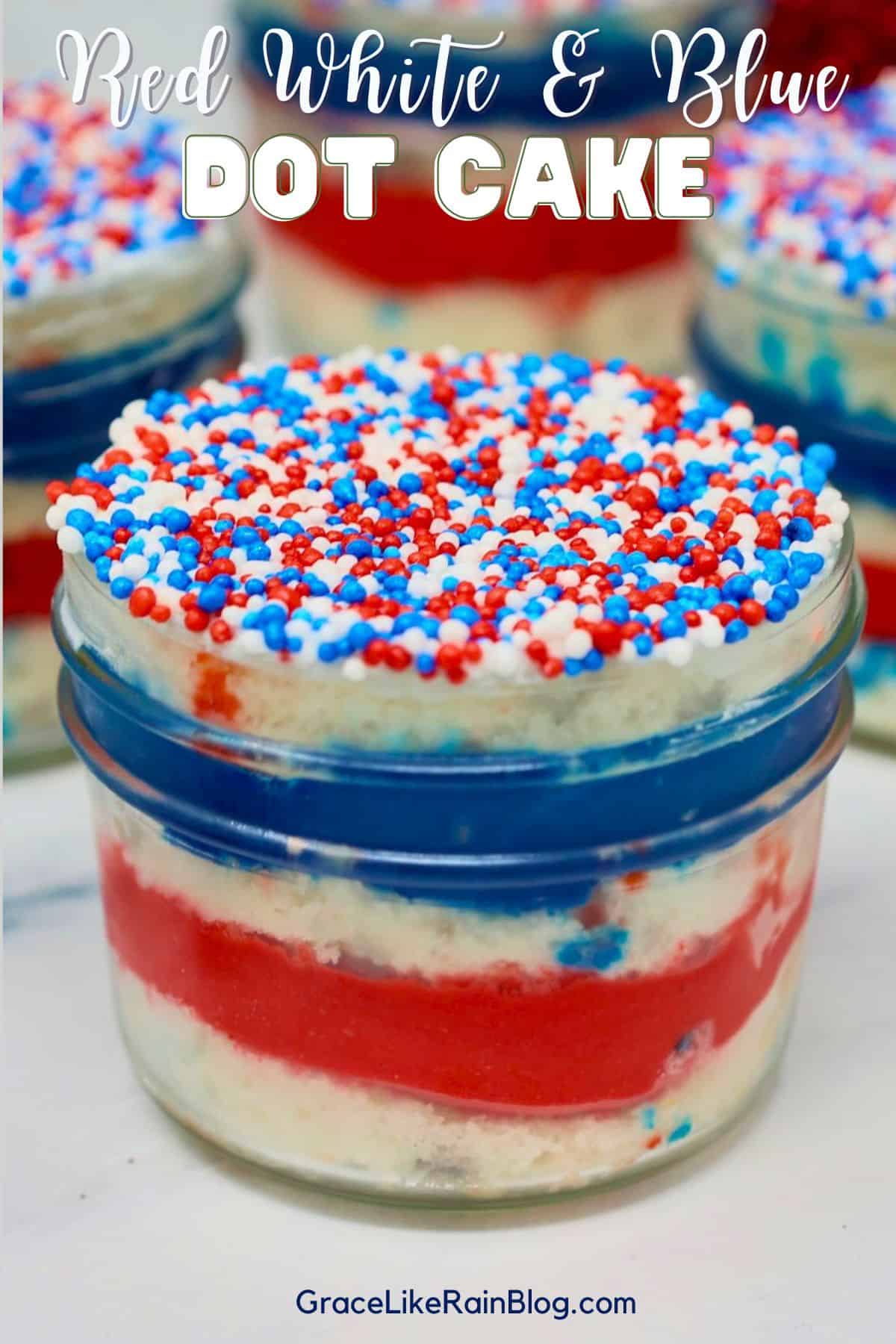 Patriotic Dot Cakes in glass jars topped with red, white, and blue nonpareils