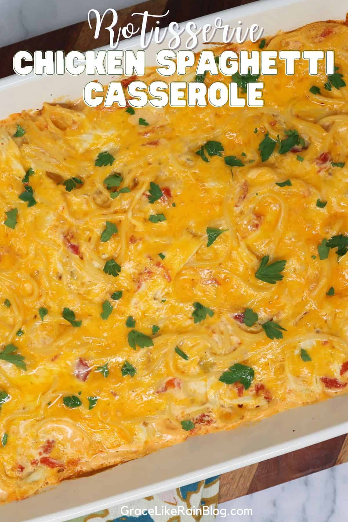 Easy rotisserie chicken spaghetti casserole baked with creamy sauce and cheddar cheese in a 9x13 dish