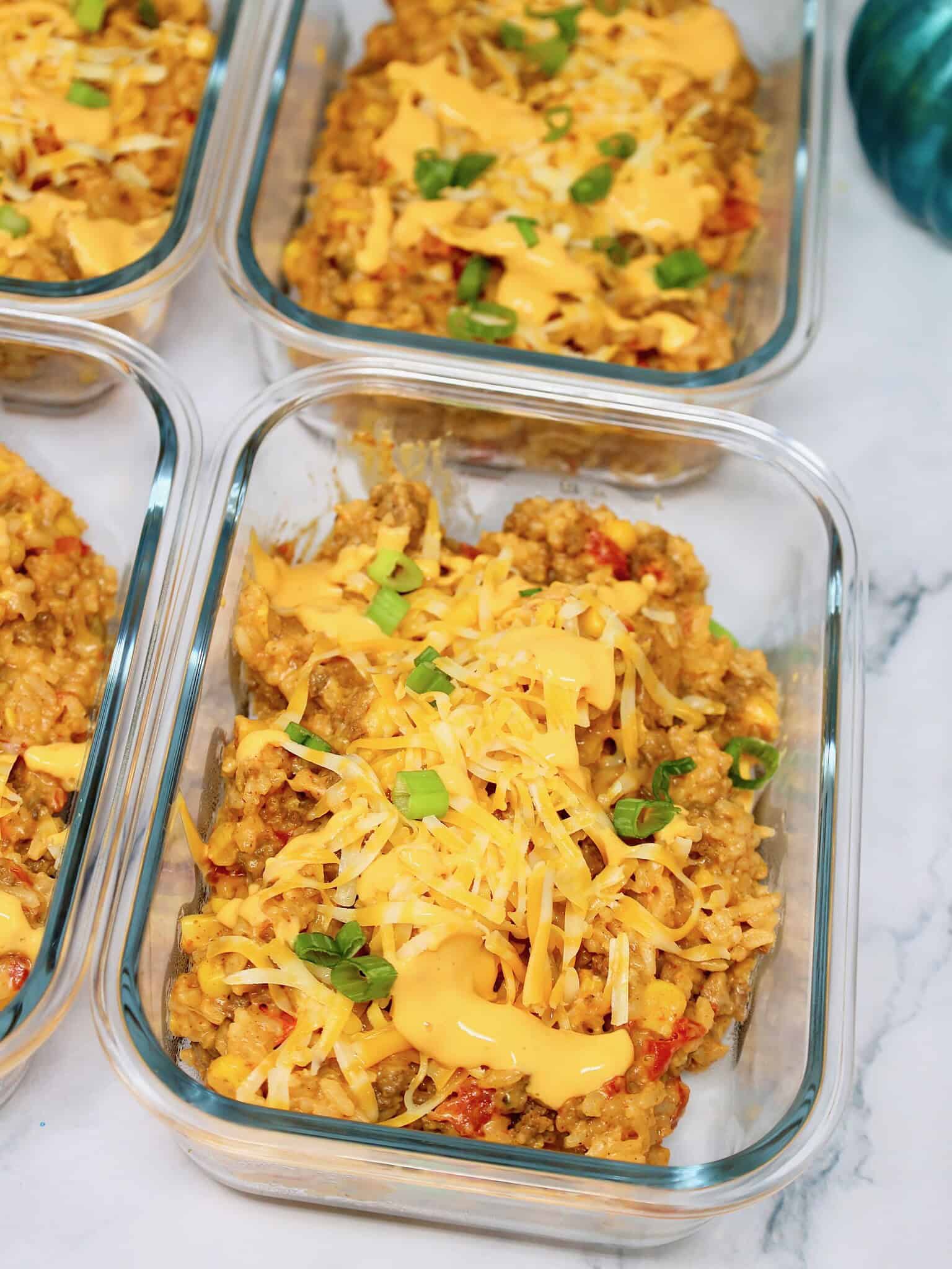 Cheesy ground beef and rice with queso sauce, corn, and taco seasoning