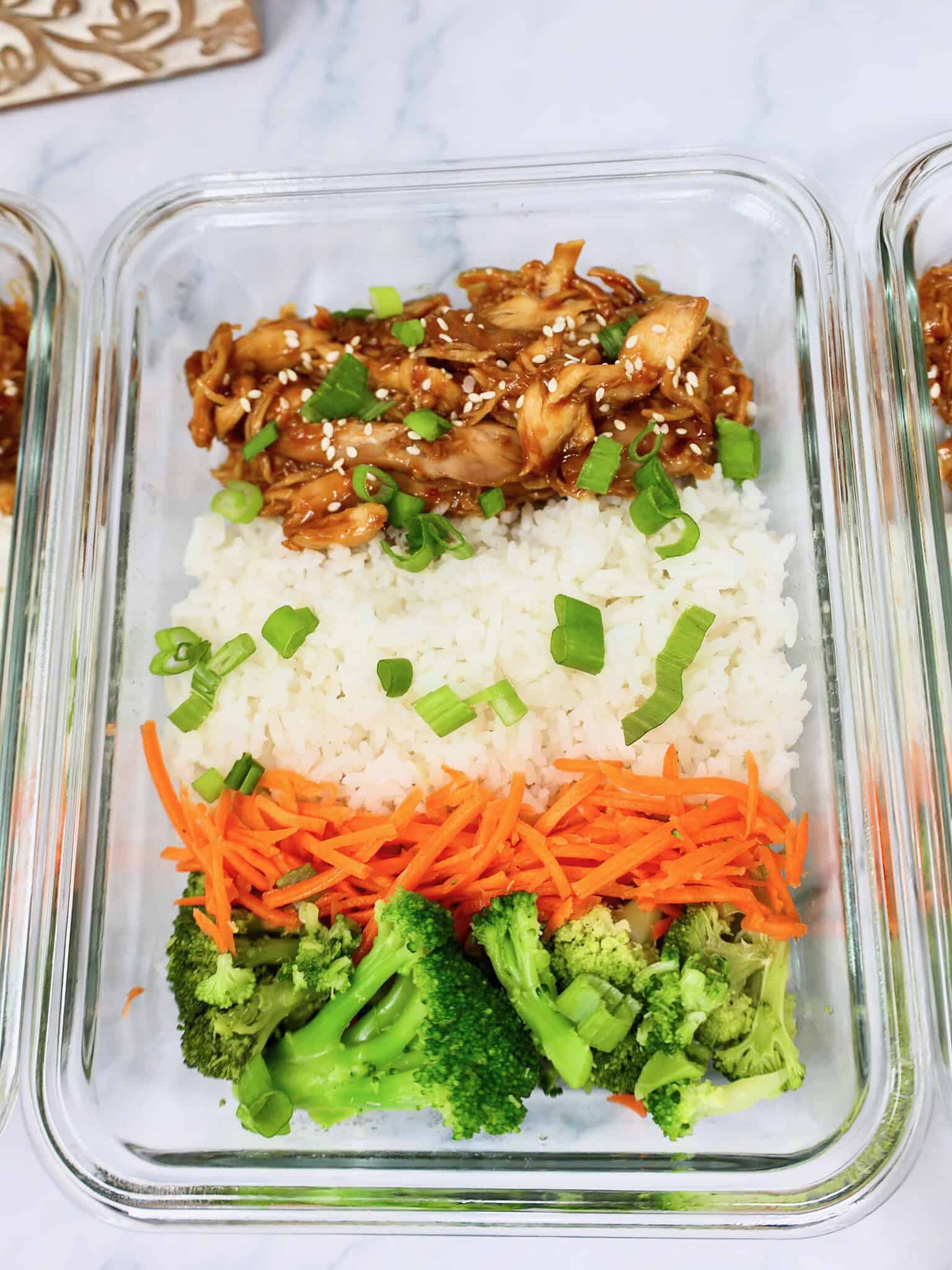 Close up of a honey garlic chicken rice bowl with coconut jasmine rice and broccoli