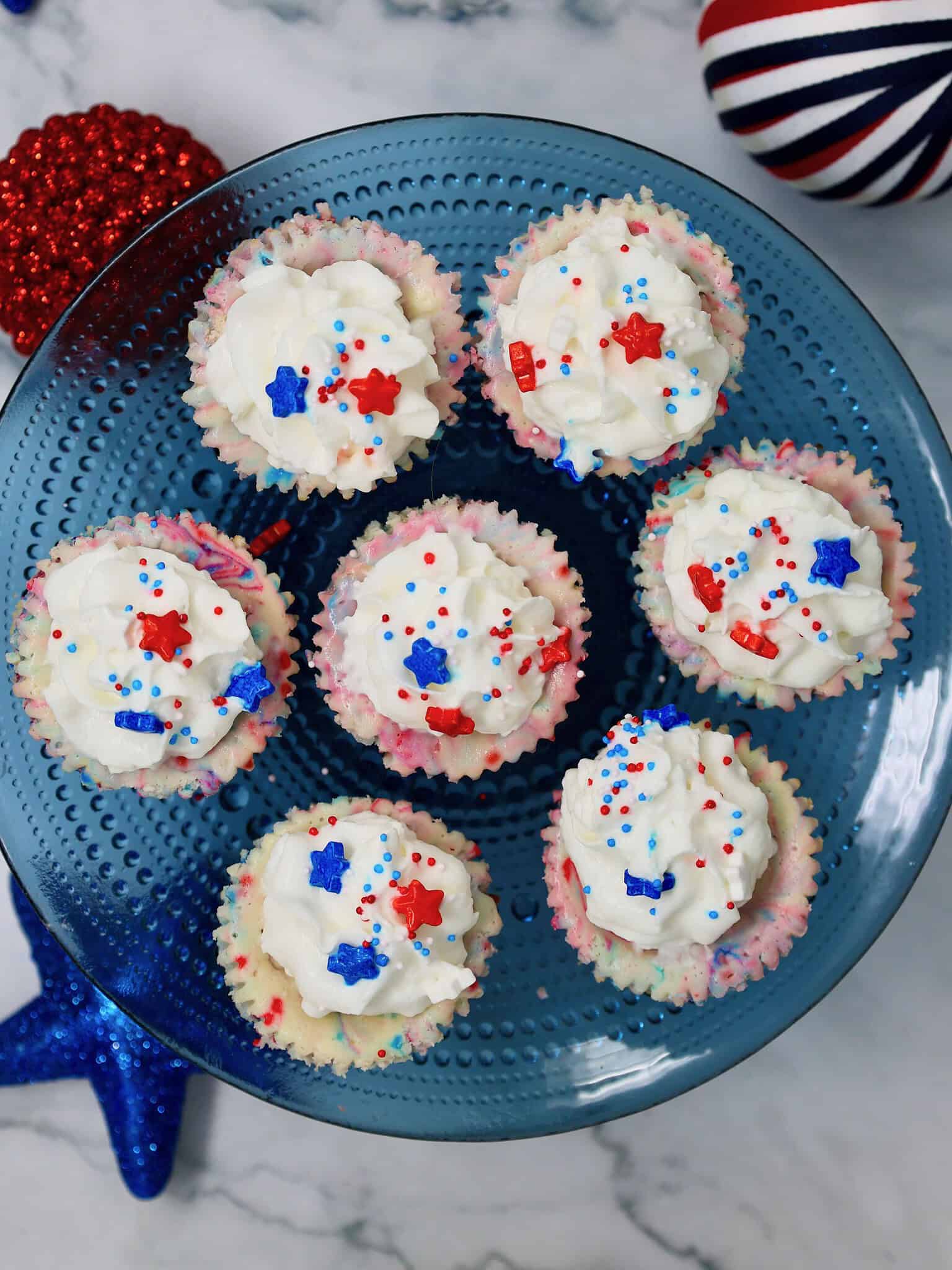 Creamy red white and blue mini cheesecakes served chilled for Memorial Day or Fourth of July