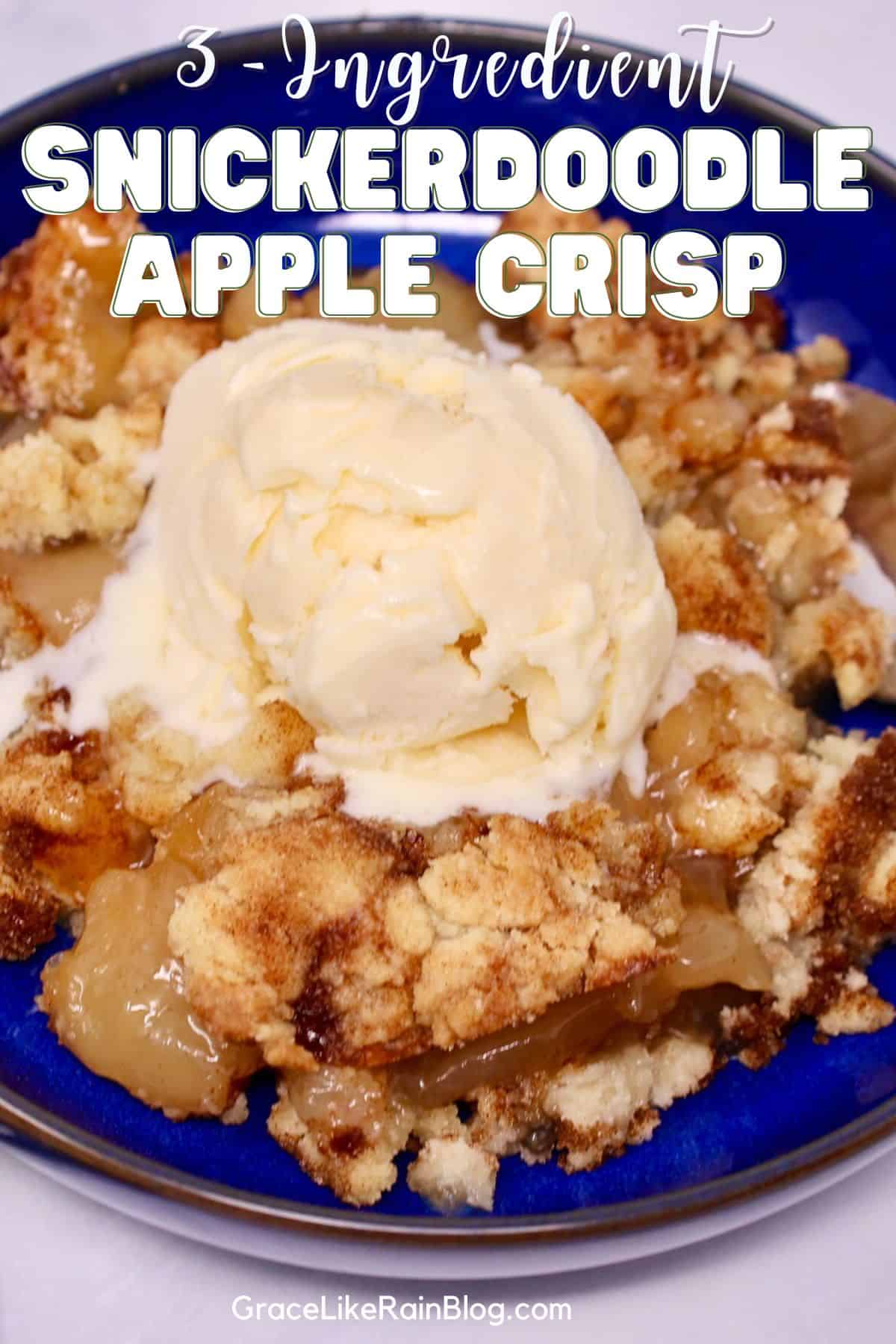 Easy 3-Ingredient Snickerdoodle Apple Crisp baked in a white dish with a golden cinnamon sugar cookie topping.