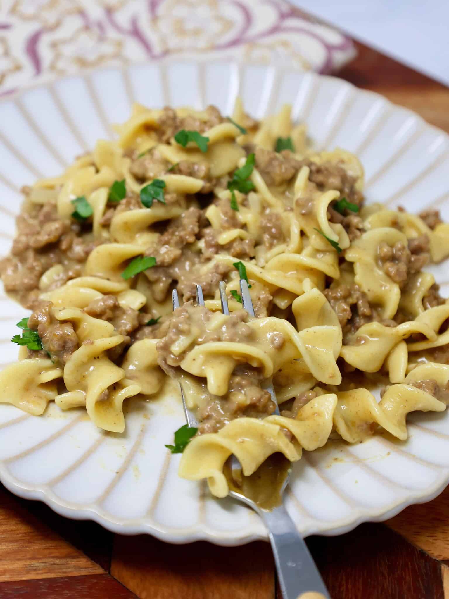 Creamy ground beef and noodles with egg noodles and melted cheese