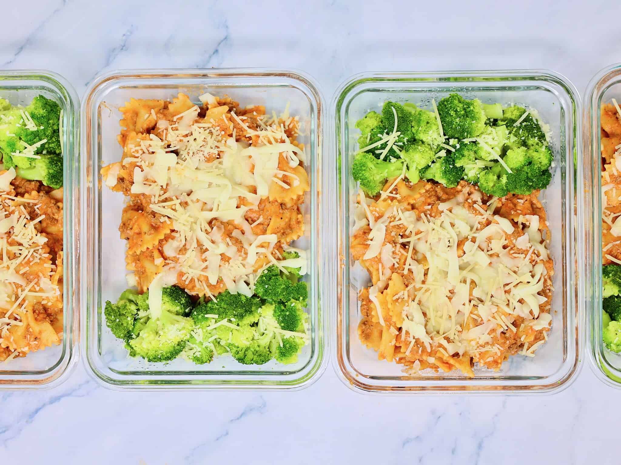 Creamy beef pasta meal prep served with steamed broccoli