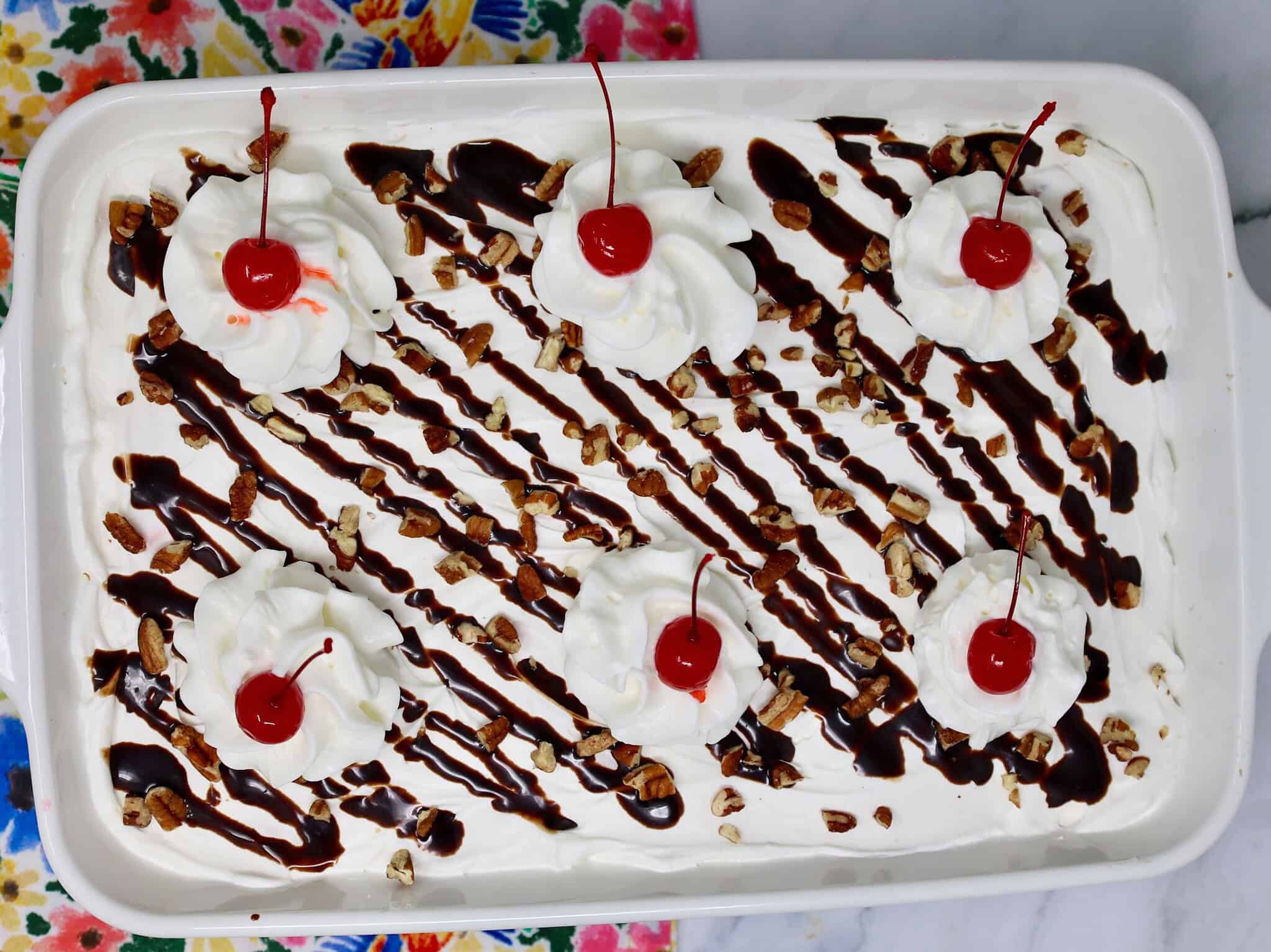 Overhead view of No Bake Banana Split Delight in a 9 by 13 inch baking dish