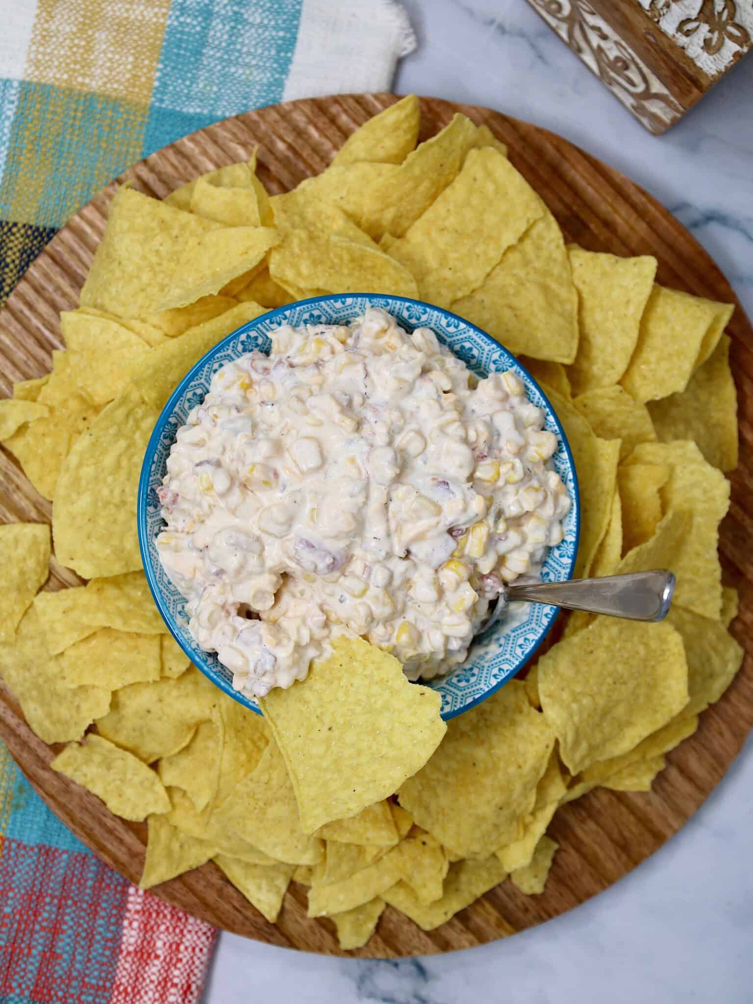 Creamy corn dip fully mixed and ready to chill