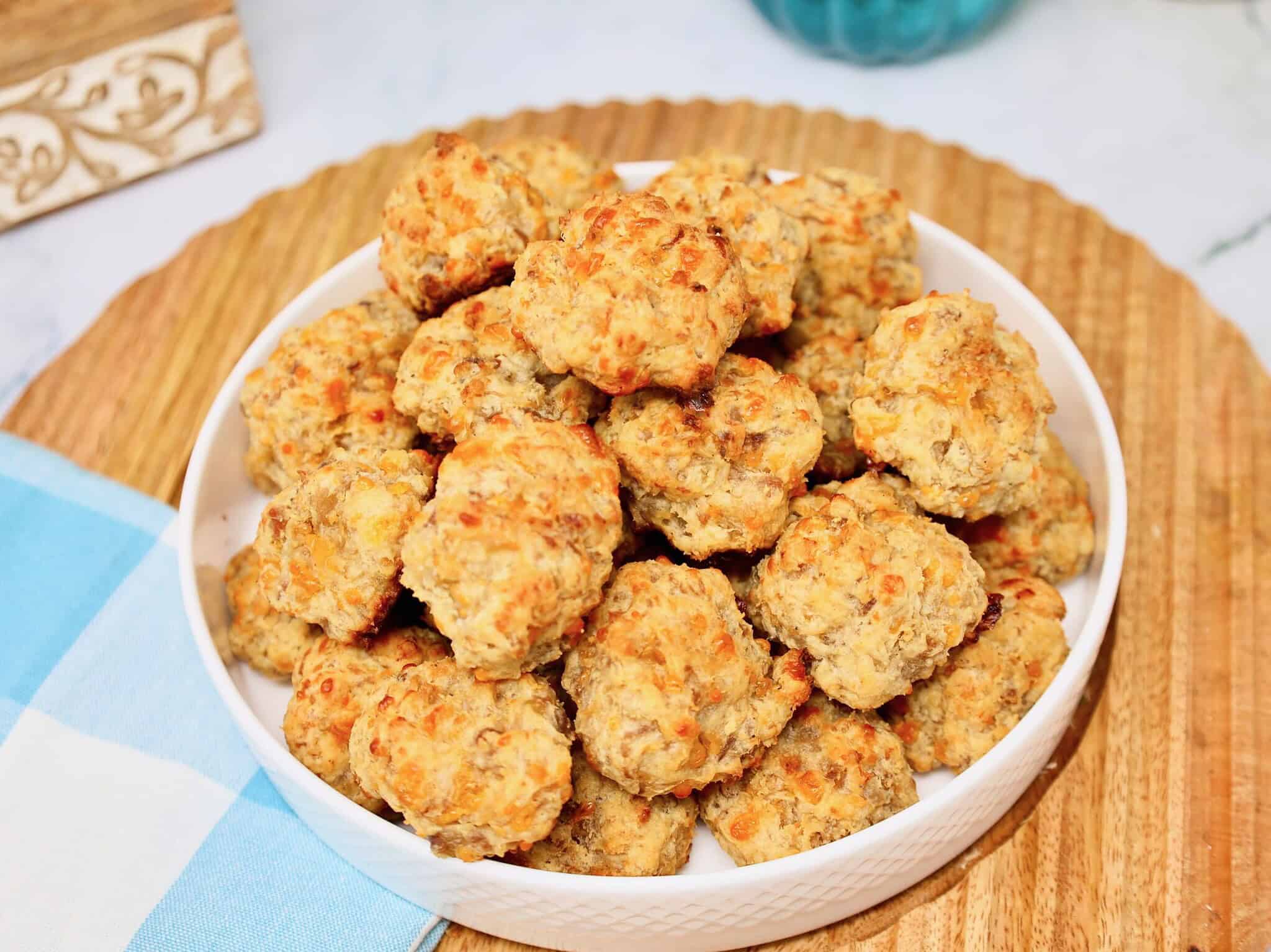 Tender maple sausage ball made with pork sausage, cheddar, and cream cheese