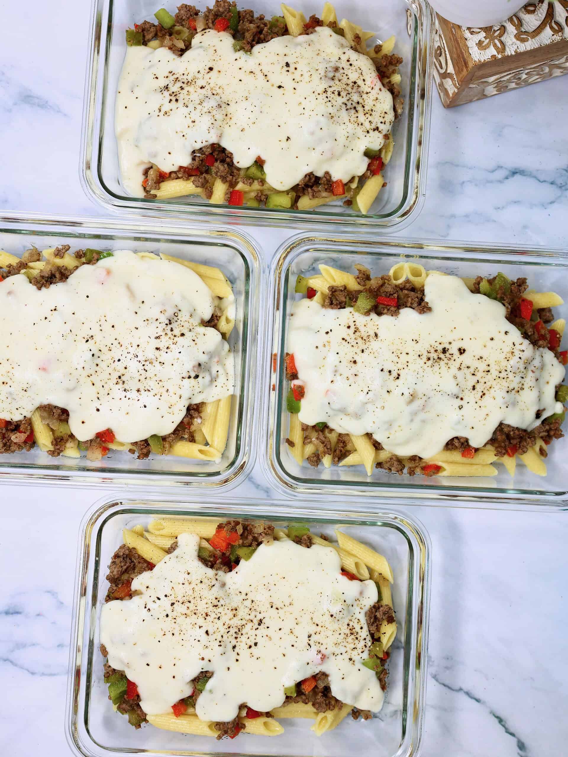 Homemade Philly cheesesteak pasta with creamy provolone sauce in an individual bowl