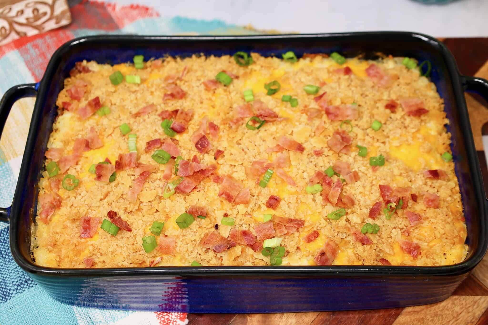 Cheesy chicken bacon ranch rice casserole baked until golden brown in a 9x13-inch dish.