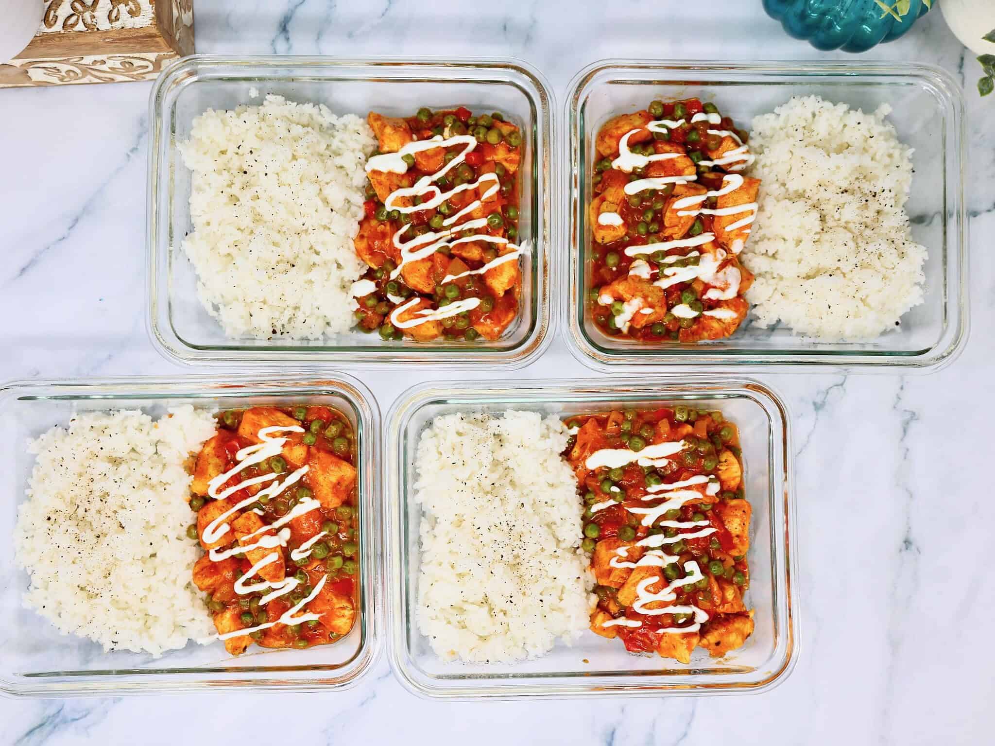 Tender chicken and vegetables in creamy tikka masala sauce over rice