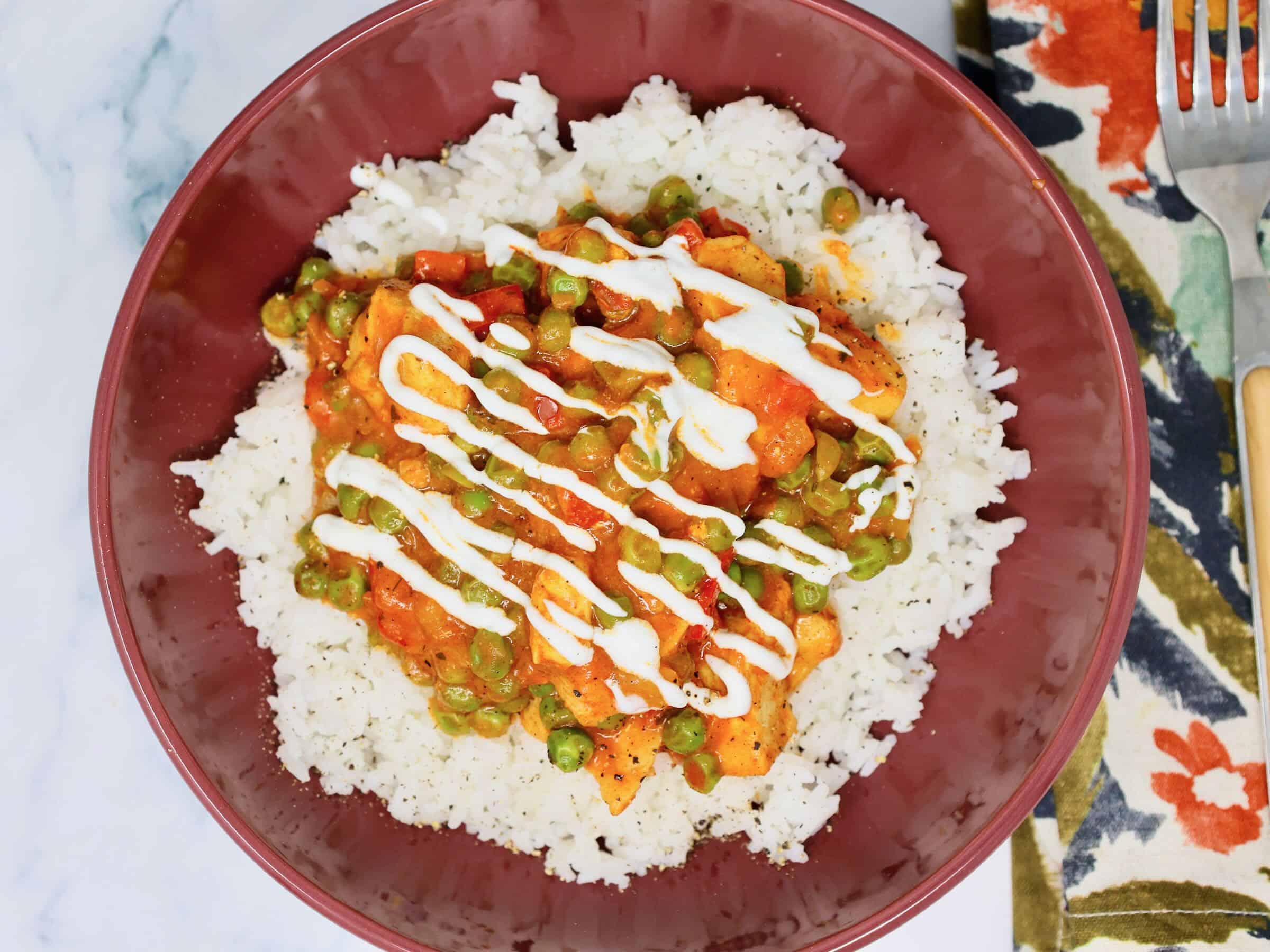 Chicken tikka masala rice bowl made with tender chicken and jarred sauc